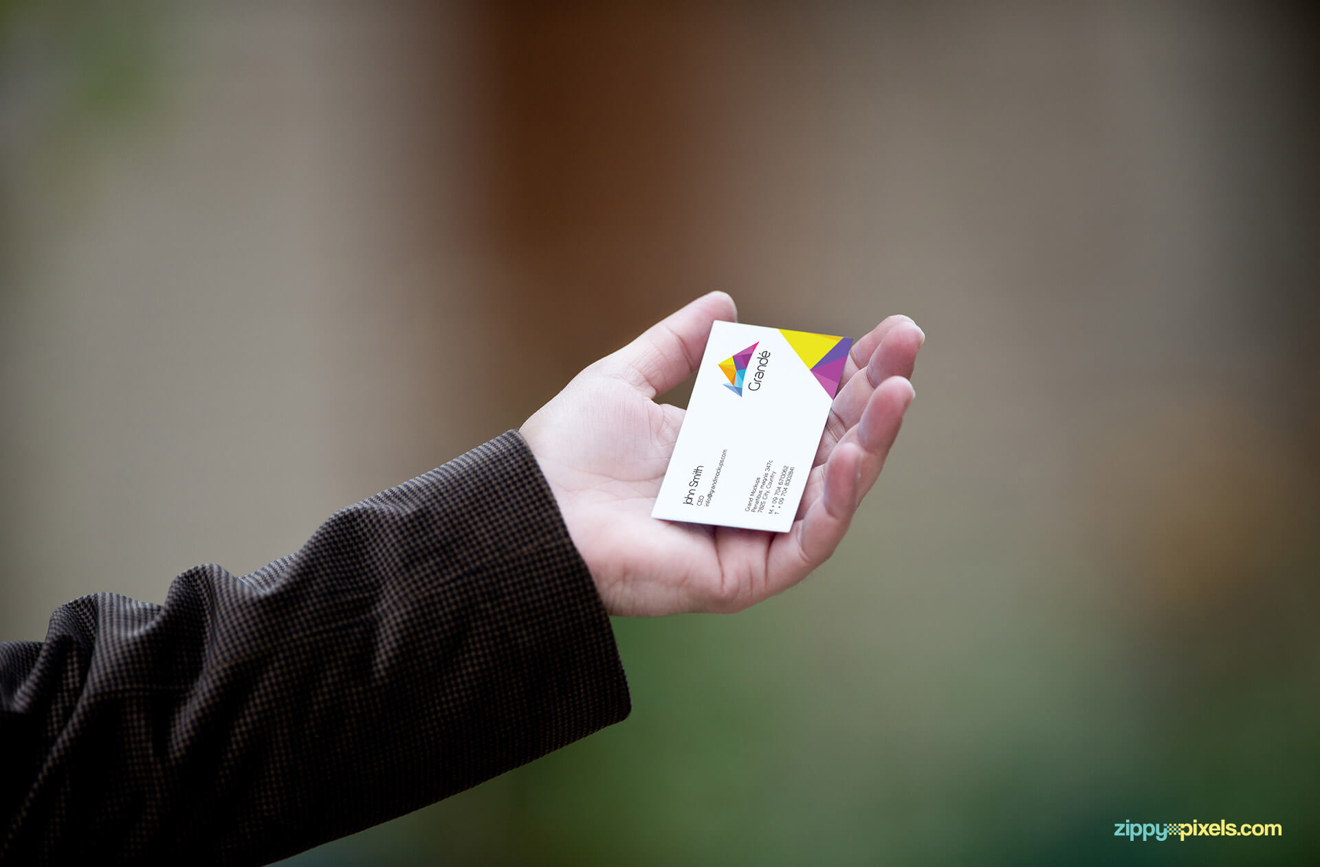 Mockup of a Business Card held in hand