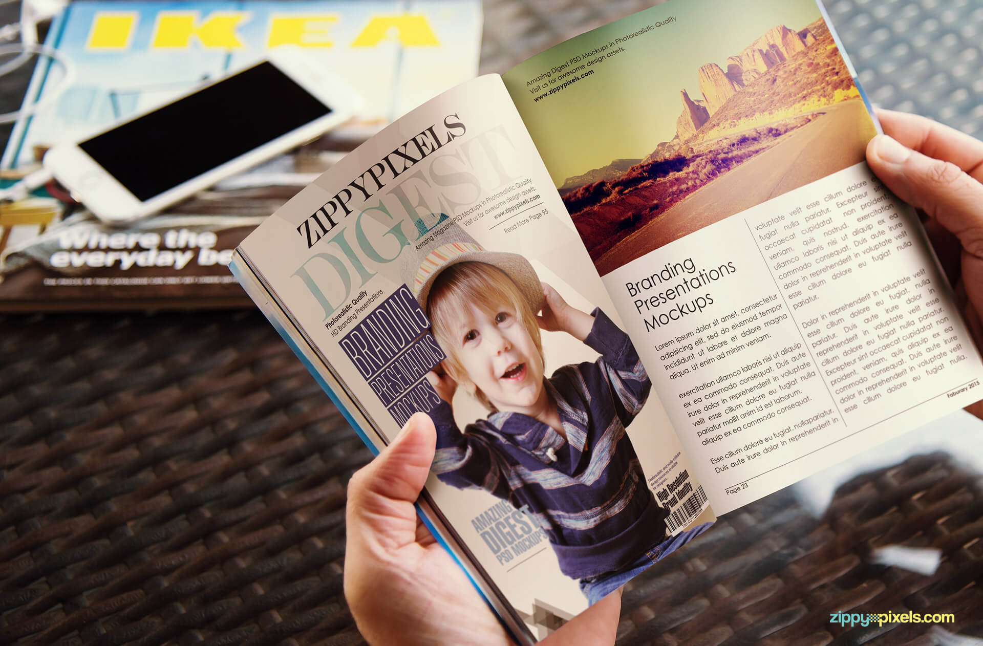 closeup view of opened digest magazine mockup with hands for inner page designs