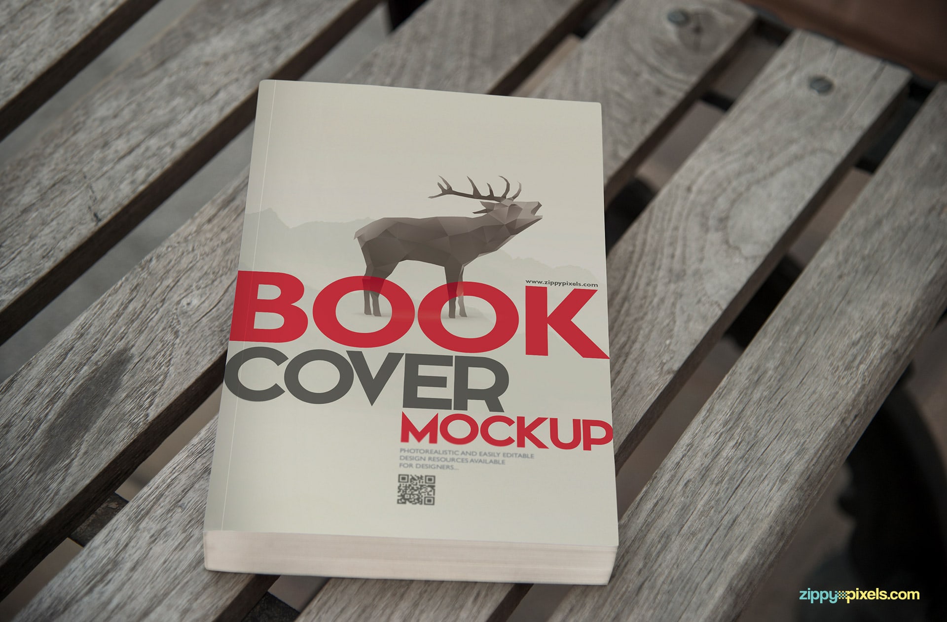 Book mockup of zoomed in view of paperback book lying on wood plank bench