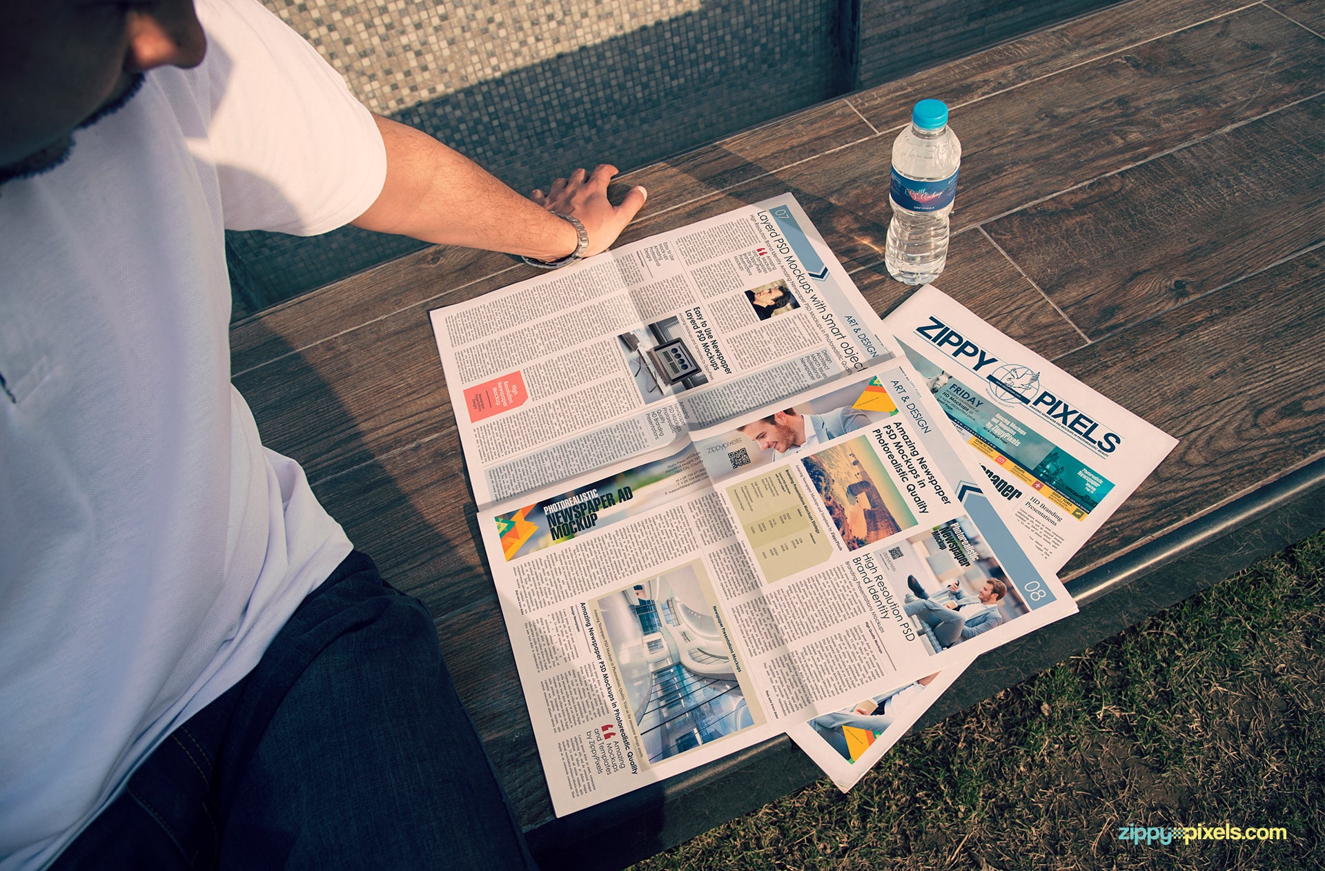 Mockup of 2 opened newspaper showing single column ad