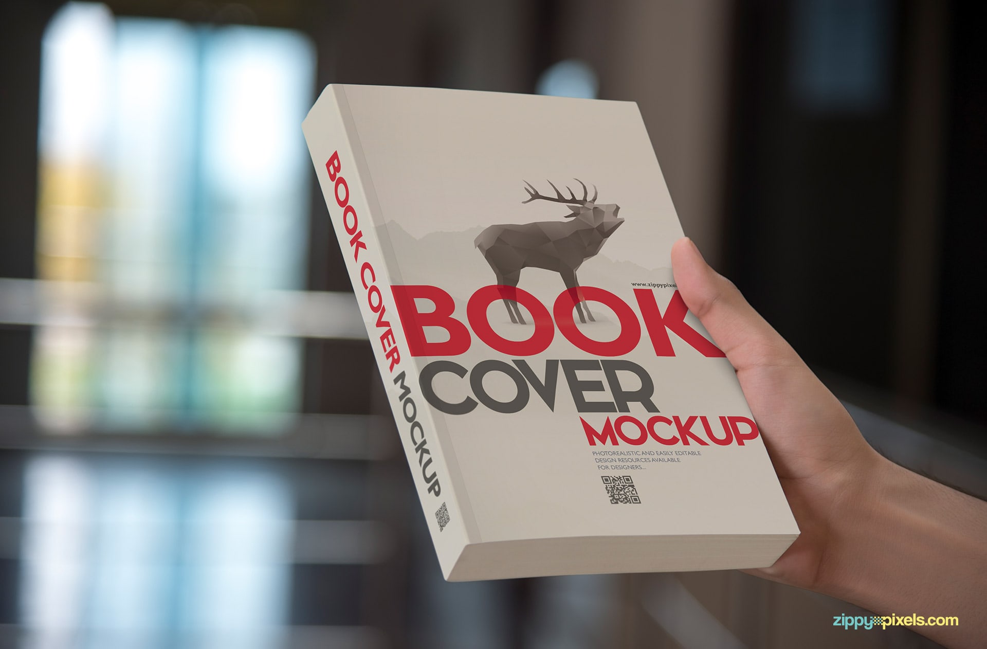 Photorealistic paperback mockup showcasing book held vertically to show front cover design