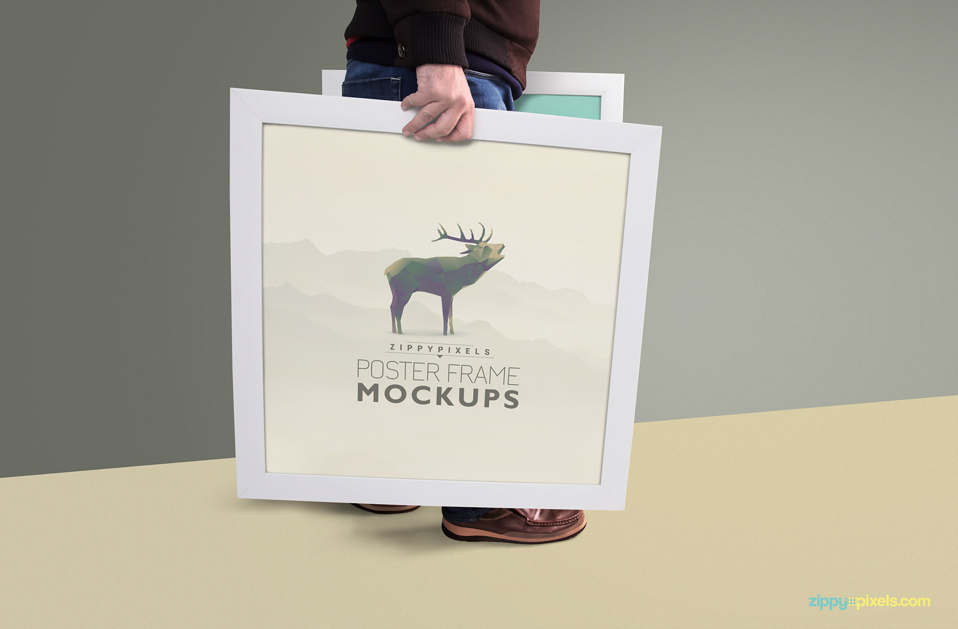 Poster Frame Mockup showing person holding sqaure frame in hands