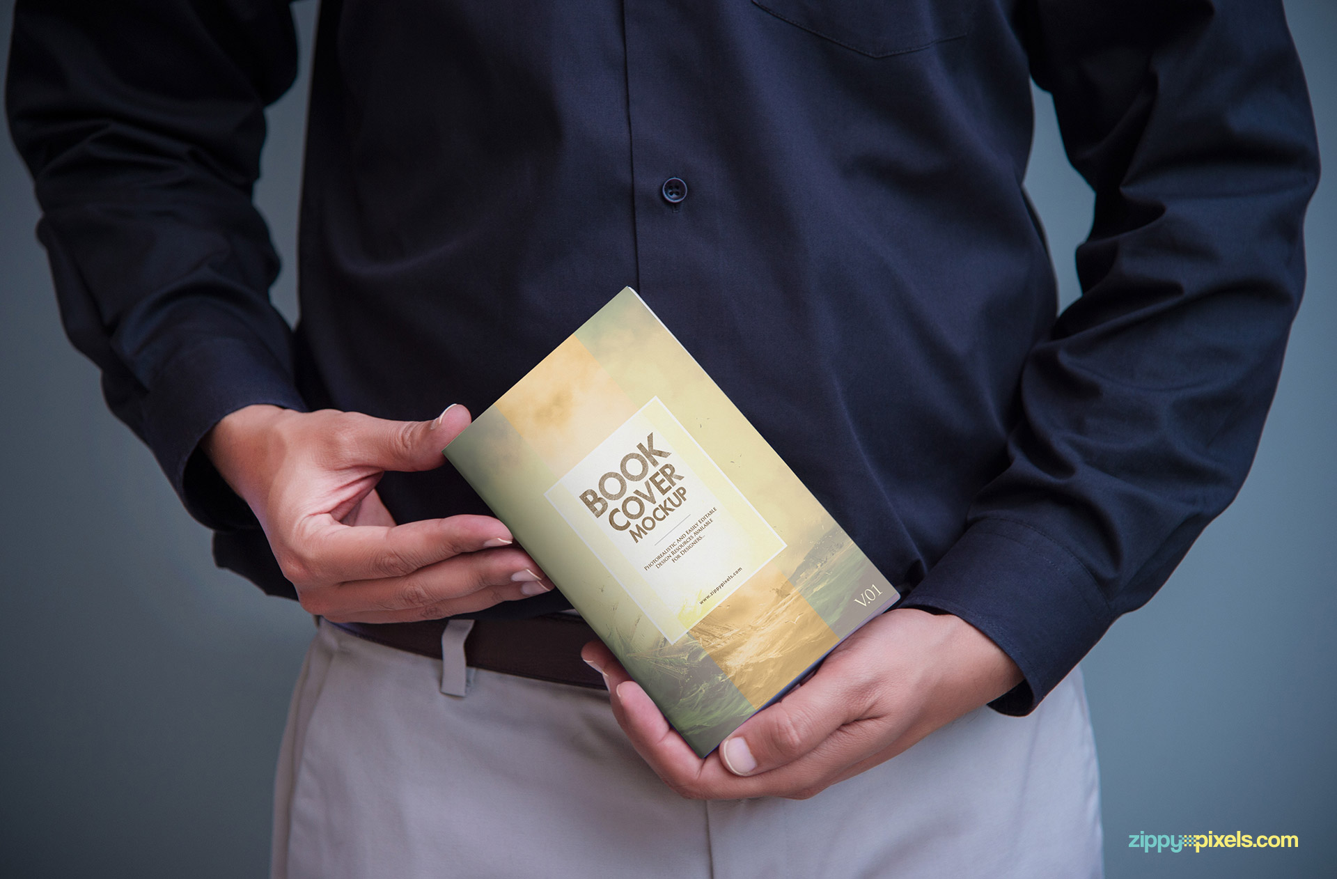 Realistic Book mockups showing a person holding a softcover book in hands to showcase cover design