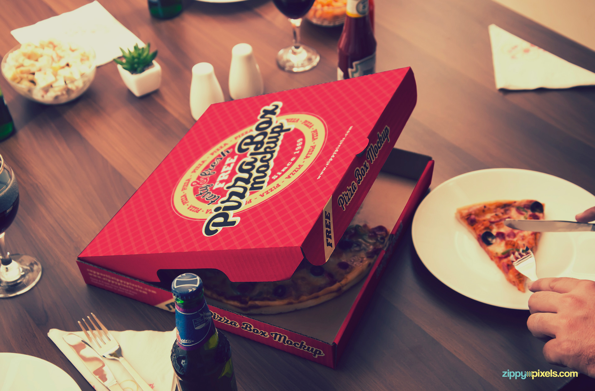 Free pizza mockup with whole dining table scene.