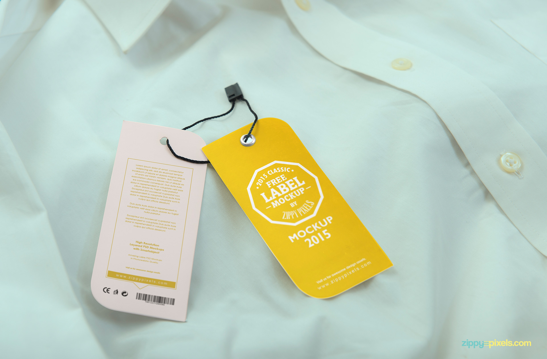 Clothing tags with front and back preview placed on the shirt.