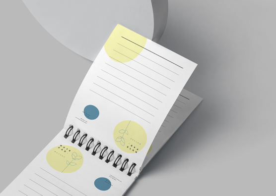 Open Spiral Notepad Mockup with Lined Pages